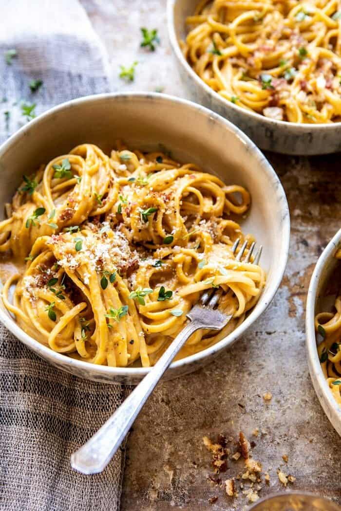 side angled close up photo of Creamy Butternut Squash Alla Vodka Pasta with for in bowl