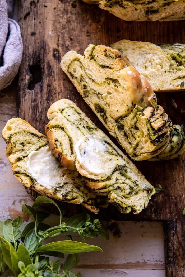 Swirled Garlic Herb Bread | halfbakedharvest.com #garlicbread #herbbread #homemadebread overhead photo of Swirled Garlic Herb Bread slices