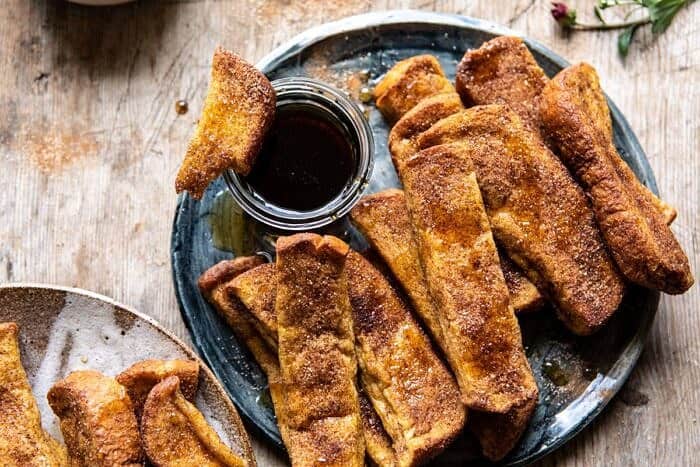 horizontal photo of Cinnamon Sugar French Toast Sticks on plate