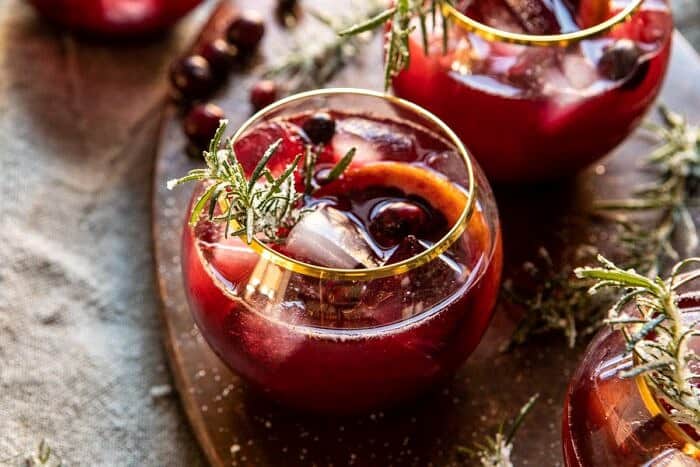Cranberry Bourbon Sour | halfbakedharvest.com #bourbon #thanksgiving #cocktails #holiday #christmas horizontal photo of Cranberry Bourbon Sour