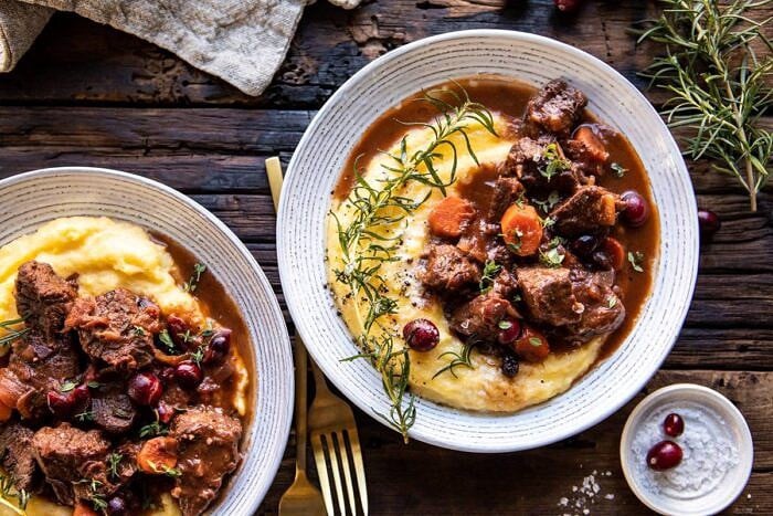 Cranberry Cider Braised Beef Stew with Rosemary Polenta | halfbakedharvest.com #slowcooker #instantpot #beef #polenta horizontal photo of Cranberry Cider Braised Beef Stew with Rosemary Polenta