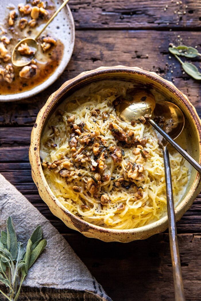 Creamed Spaghetti Squash with Browned Butter Walnuts | halfbakedharvest.com #spaghettisquash #healthy #thanksgiving #sage overhead photo of Creamed Spaghetti Squash with Browned Butter Walnuts