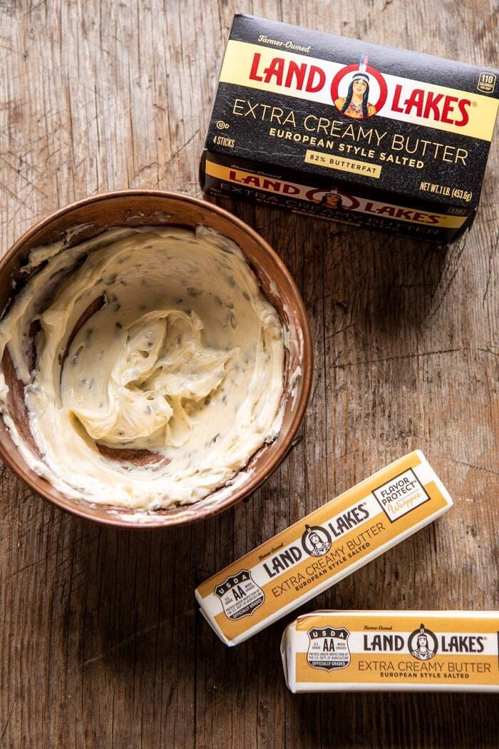 Hasselback Butternut Squash with Sage Butter and Prosciutto Breadcrumbs | halfbakedharvest.com #thanksgiving #sidedishes #butternutsquash herb butter in bowl