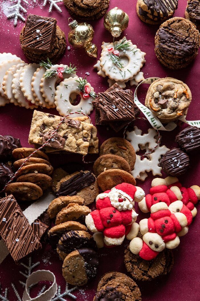 2019 Holiday Cookie Box | halfbakedharvest.com #cookies #christmas #cookiebox #howto overhead photo of 2019 Holiday Cookies all together on table before adding to box