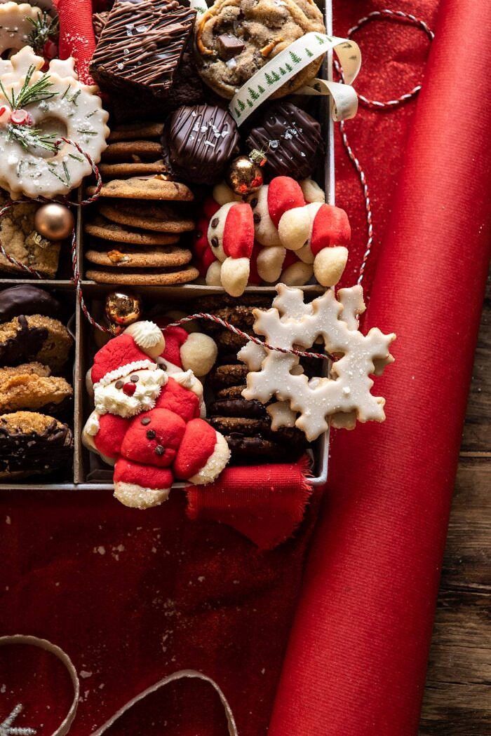 2019 Holiday Cookie Box | halfbakedharvest.com #cookies #christmas #cookiebox #howto close up photo of holly jolly santa cookie