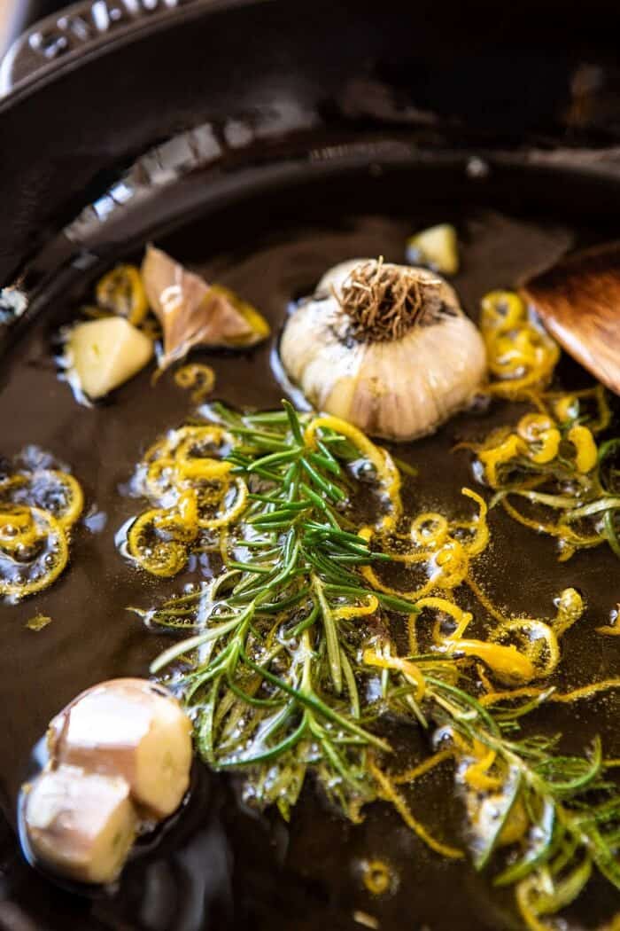 side angled photo of lemon pepper olive oil in skillet