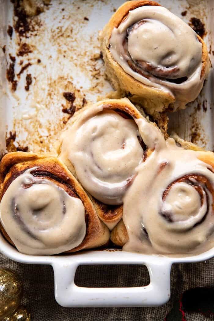 overhead close up photo of Easy Gingerbread Brioche Cinnamon Rolls in pan