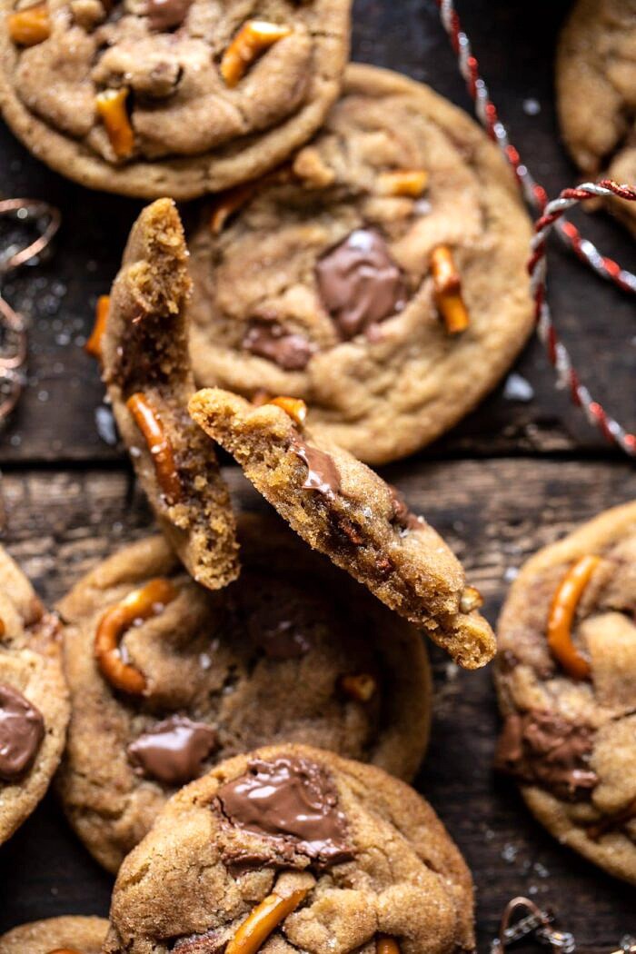 close up photo of Salted Caramel Pretzel Snickerdoodle cookie broken in half