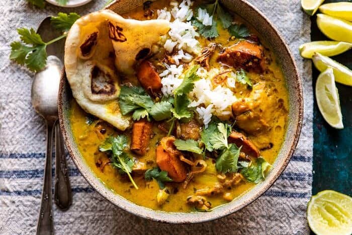 horizontal photo of 30 Minute Coconut Milk Braised Chicken with Sweet Potatoes and Rice