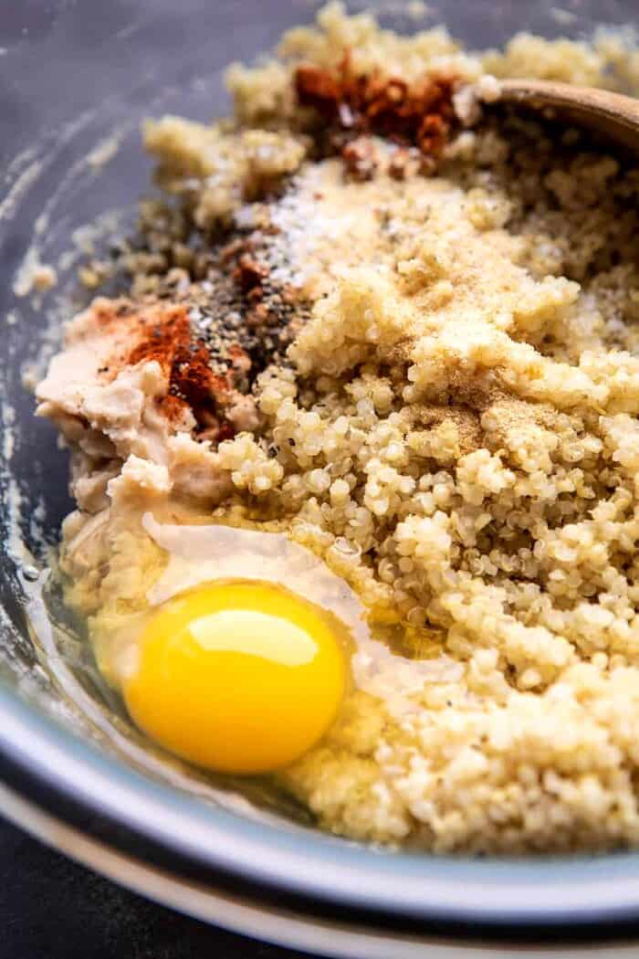 Crispy Quinoa Burgers Topped with Sweet Potato Fries and Beer Caramelized Onions | halfbakedharvest.com #quinoaburger