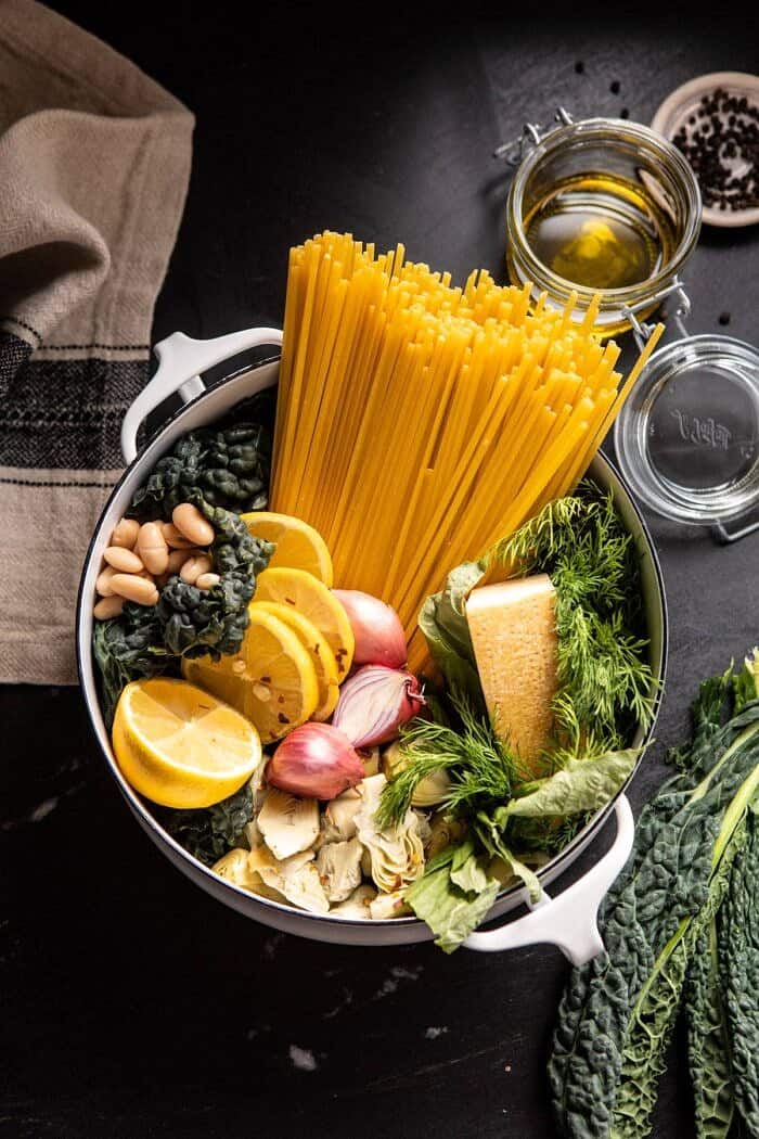 overhead photo of One Pot Creamy Tuscan Pesto and Artichoke Pasta before cooking 