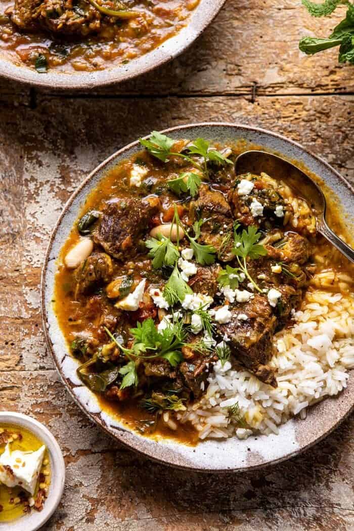 Persian Herb and Beef Stew | halfbakedharvest.com #beefstew #whitebeans #healthy overhead close up photo of Persian Herb and Beef Stew
