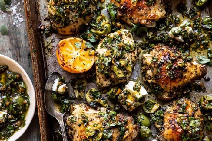 Roasted Garlic Butter Chicken with Lemon Olive Dressing | halfbakedharvest.com #chicken #sheetpan #easyrecipes horizontal overhead photo of Roasted Garlic Butter Chicken with Lemon Olive Dressing