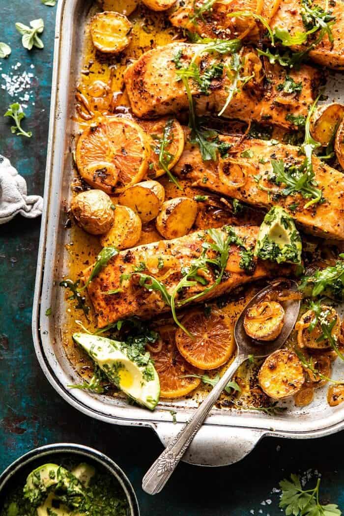 Sheet Pan Salmon with Citrus Avocado Salsa and Potatoes | halfbakedharvest.com #sheetpan #salmon #healthy overhead close up photo of Sheet Pan Salmon with Citrus Avocado Salsa and Potatoes
