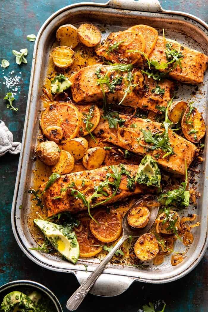 Sheet Pan Salmon with Citrus Avocado Salsa and Potatoes | halfbakedharvest.com #sheetpan #salmon #healthy overhead photo of Sheet Pan Salmon with Citrus Avocado Salsa and Potatoes
