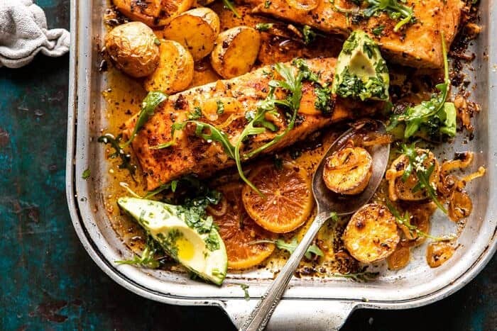 Sheet Pan Salmon with Citrus Avocado Salsa and Potatoes | halfbakedharvest.com #sheetpan #salmon #healthy horizontal photo of Sheet Pan Salmon with Citrus Avocado Salsa and Potatoes