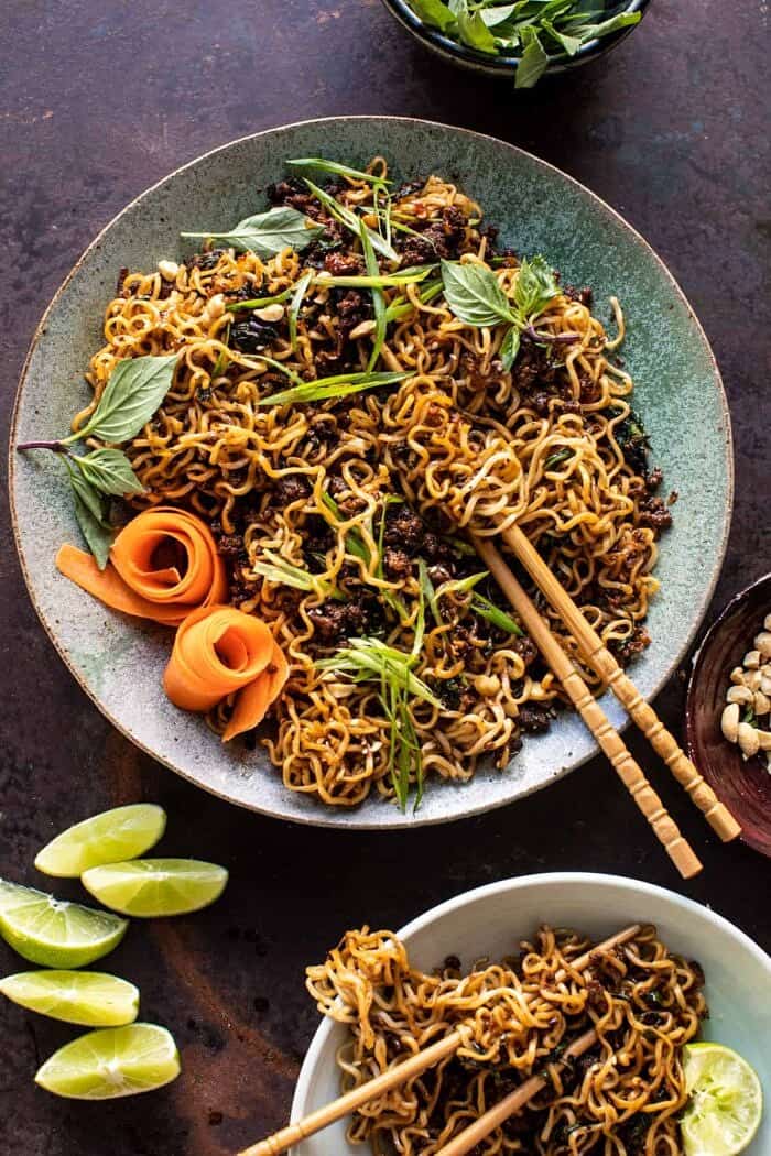 overhead photo of 30 Minute Caramelized Shallot Beef Ramen Noodles with chopstick in noodle bowl 