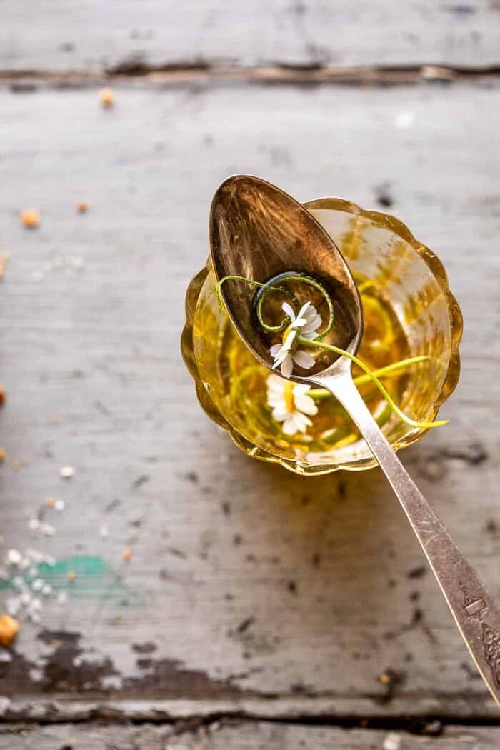 No Fuss Coconut Lime Tart | halfbakedharvest.com prep photo of lime honey