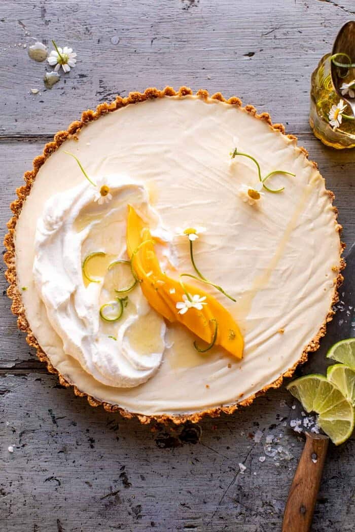 No Fuss Coconut Lime Tart | halfbakedharvest.com overhead photo of No Fuss Coconut Lime Tart before cutting