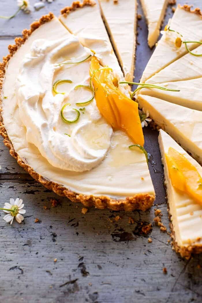 No Fuss Coconut Lime Tart | halfbakedharvest.com side angled photo of No Fuss Coconut Lime Tart