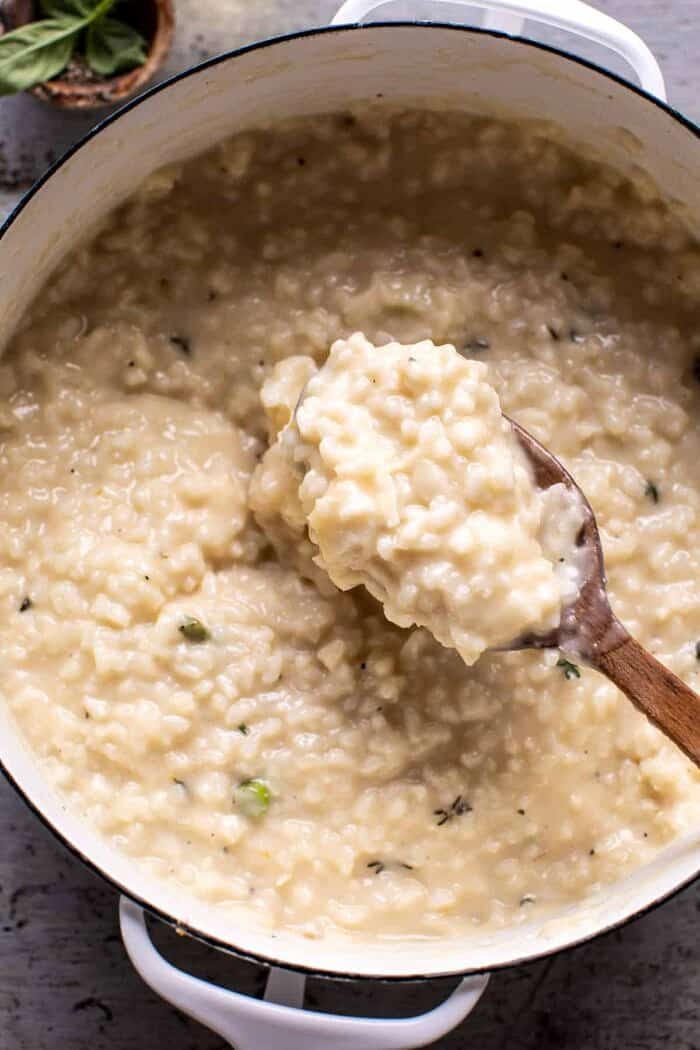 No Stir Brie Risotto with Lemon Butter Asparagus | halfbakedharvest.com overhead photo of No Stir Brie Risotto in pot before adding asparagus