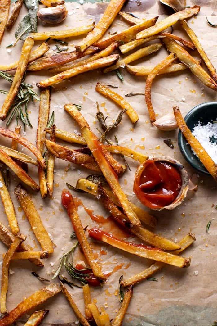 Oven Baked Tuscan Fries | halfbakedharvest.com with half of the fries eaten