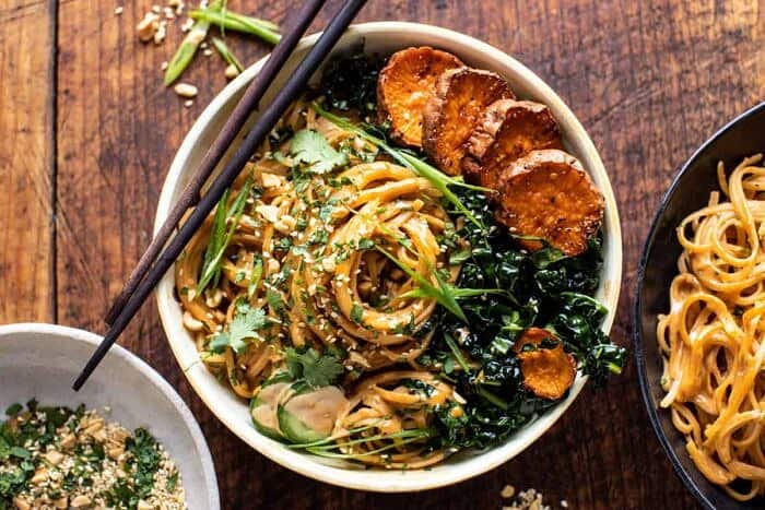 overhead horizontal photo of Saucy Tahini Noodles with Honey'd Sweet Potatoes