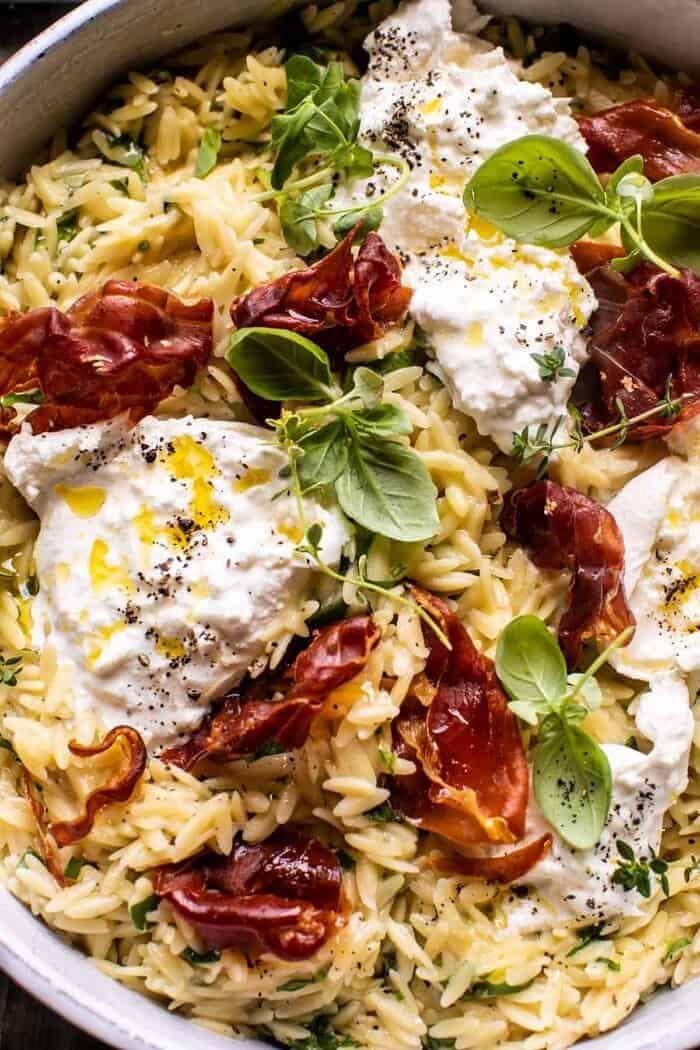 overhead close up photo of 20 Minute Orzo Carbonara with Crispy Prosciutto and Burrata 
