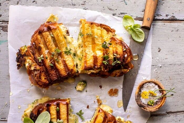 overhead photo of Artichoke and Broccoli Pesto Brie Panini with Thyme Honey