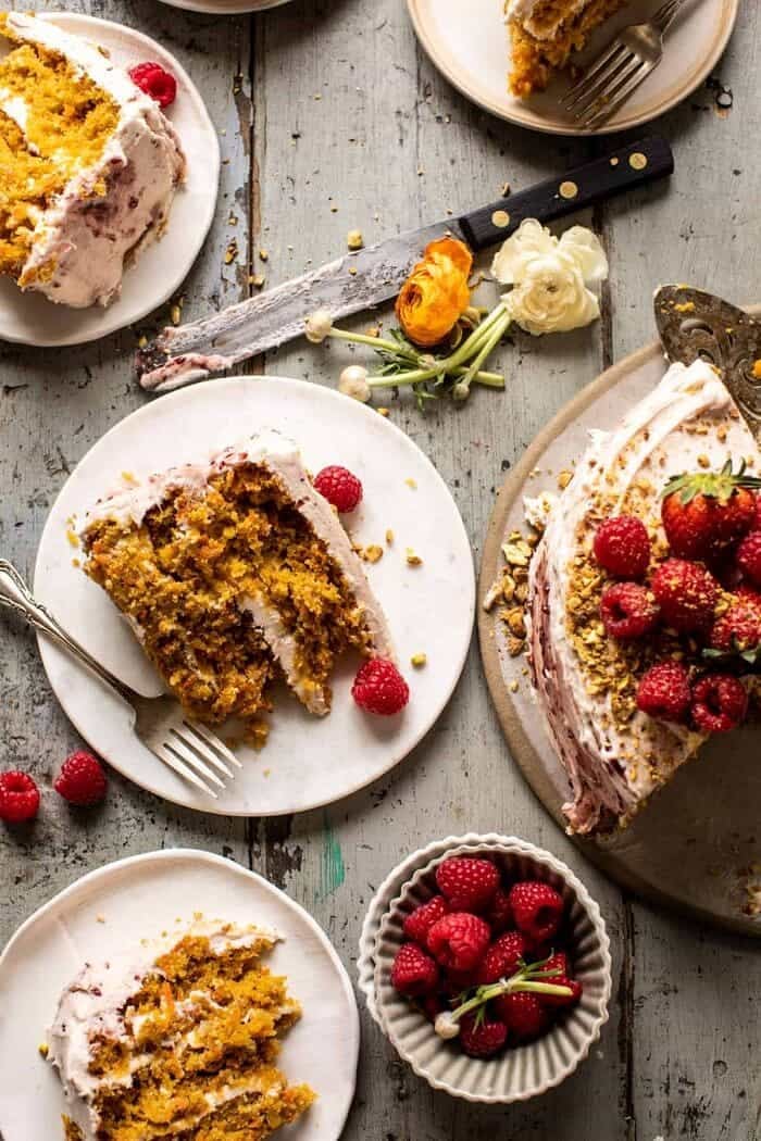 overhead photo of Coconut Carrot Cake slices on plates with forks