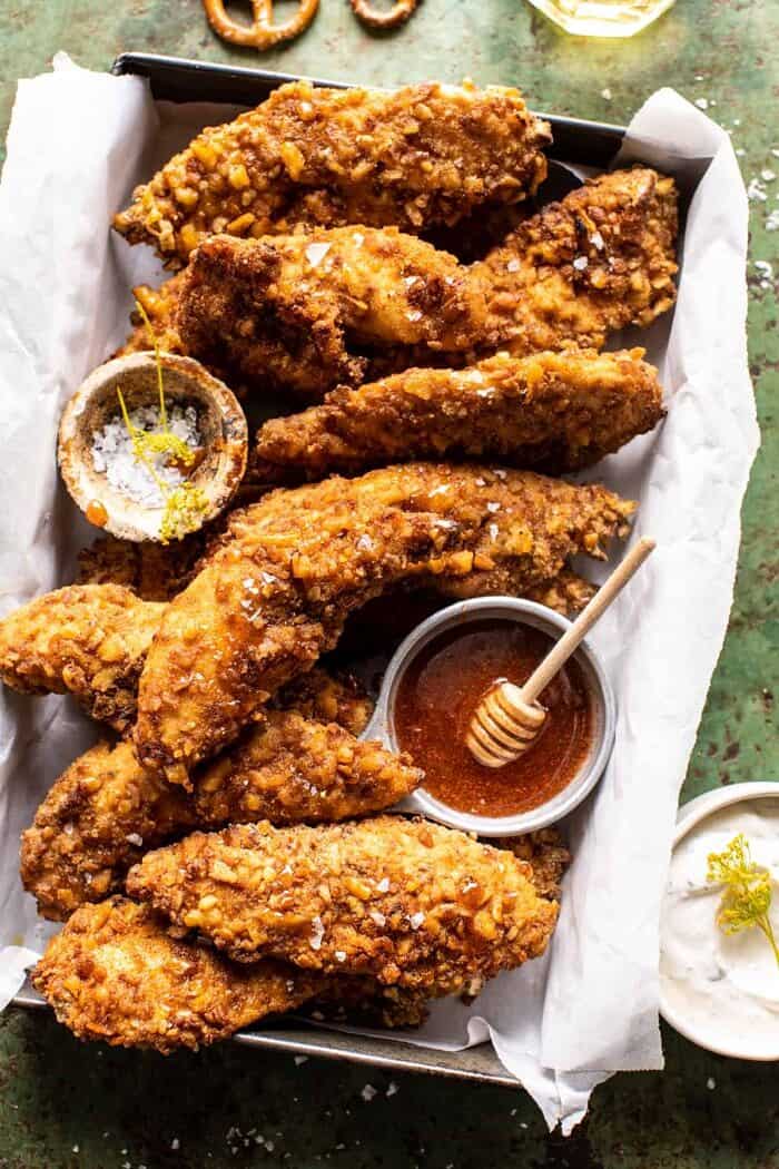 Spicy Honey Mustard Pretzel Chicken Fingers | halfbakedharvest.com overhead photo of Spicy Honey Mustard Pretzel Chicken Fingers