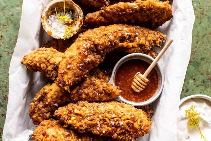 Spicy Honey Mustard Pretzel Chicken Fingers | halfbakedharvest.com overhead horizontal photo of Spicy Honey Mustard Pretzel Chicken Fingers