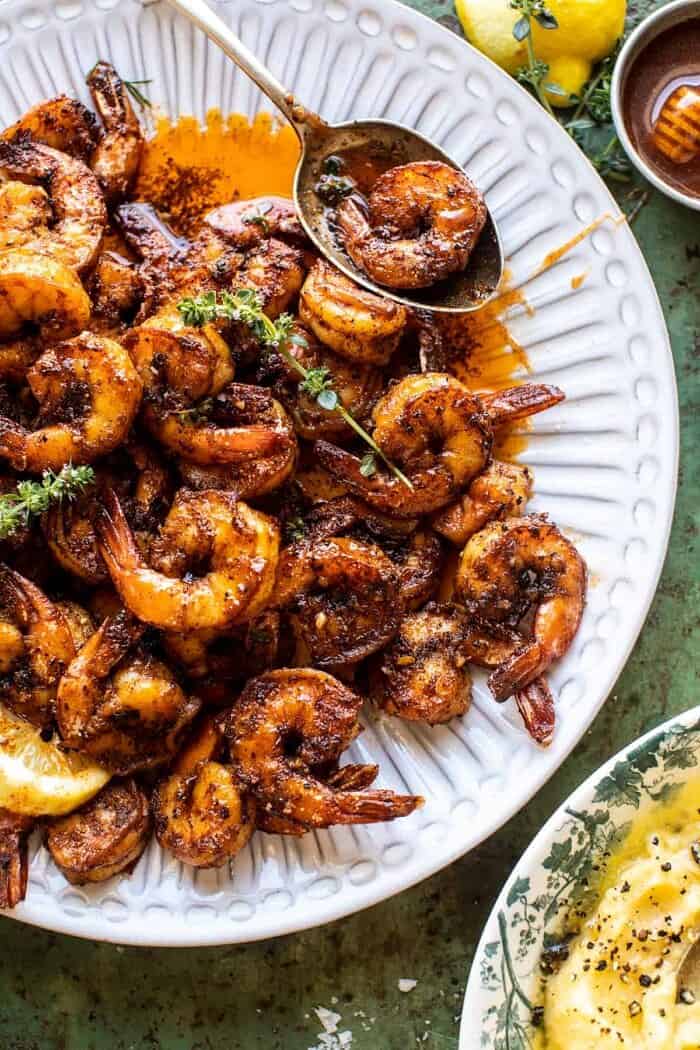 overhead close up photo of 15 Minute Cajun Hot Honey Butter Shrimp on serving plate