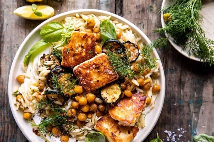 overhead horizontal photo of Crispy Lemon Feta with Spiced Chickpeas and Basil Orzo 