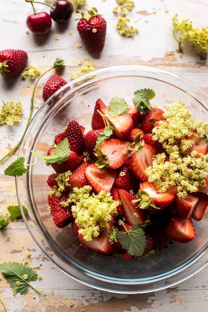 Double Strawberry Pretzel Pie | halfbakedharvest.com prep photo of strawberries