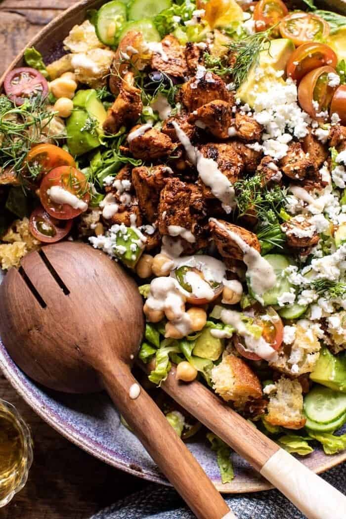 overhead close up photo of Greek Chicken Chopped Salad with Lemon Tahini Vinaigrette