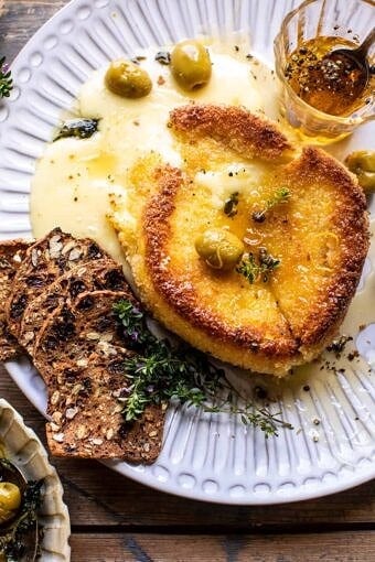 Pan Fried Brie with Peppered Honey and Olives | halfbakedharvest.com