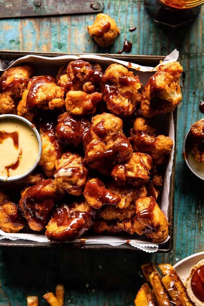 Crispy Beer Battered BBQ Cauliflower Nuggets | halfbakedharvest.com overhead close up photo of Crispy Beer Battered BBQ Cauliflower Nuggets