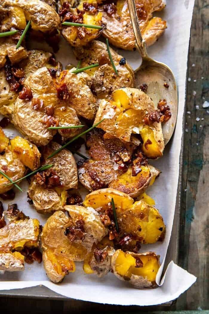 Crispy Smashed Potatoes with Bacon Vinaigrette | halfbakedharvest.com overhead close up photo of Crispy Smashed Potatoes with Bacon Vinaigrette