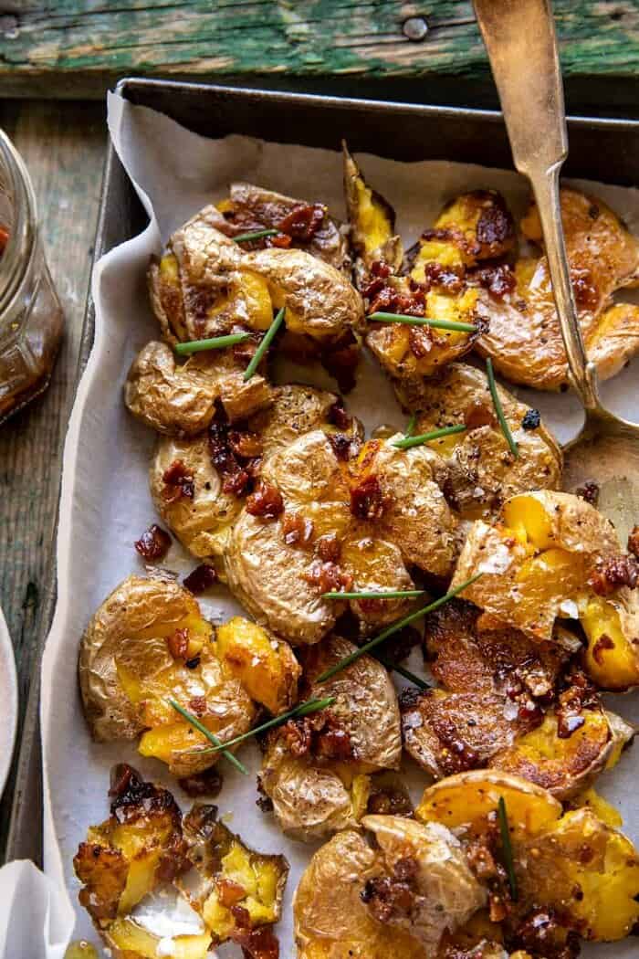 Crispy Smashed Potatoes with Bacon Vinaigrette | halfbakedharvest.com overhead close up photo of Crispy Smashed Potatoes with Bacon Vinaigrette