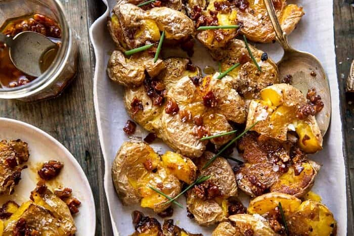 Crispy Smashed Potatoes with Bacon Vinaigrette | halfbakedharvest.com overhead horizontal photo of Crispy Smashed Potatoes with Bacon Vinaigrette