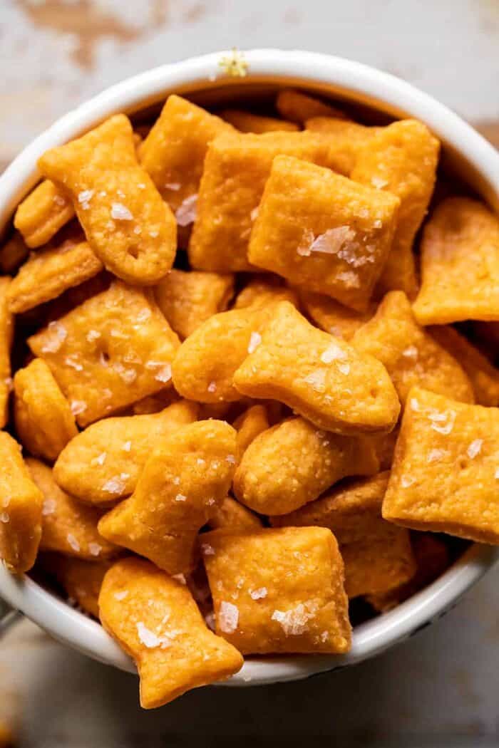 Homemade Goldfish | halfbakedharvest.com overhead closeup photo of Homemade Goldfish in bowl