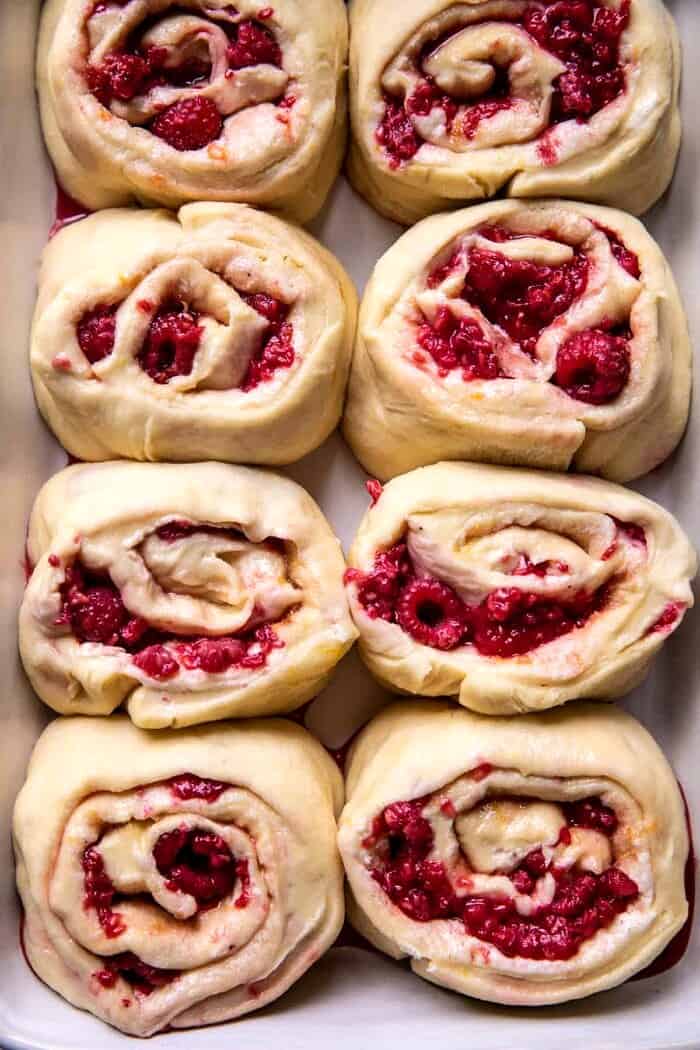 Raspberry Lemon Brioche Rolls with Whipped Ricotta Cream | halfbakedharvest.com overhead photo of Raspberry Lemon Brioche Rolls in baking pan before baking