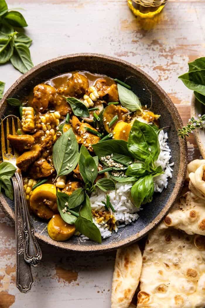overhead close up photo of Spicy Coconut Basil Chicken Curry with Garden Vegetables