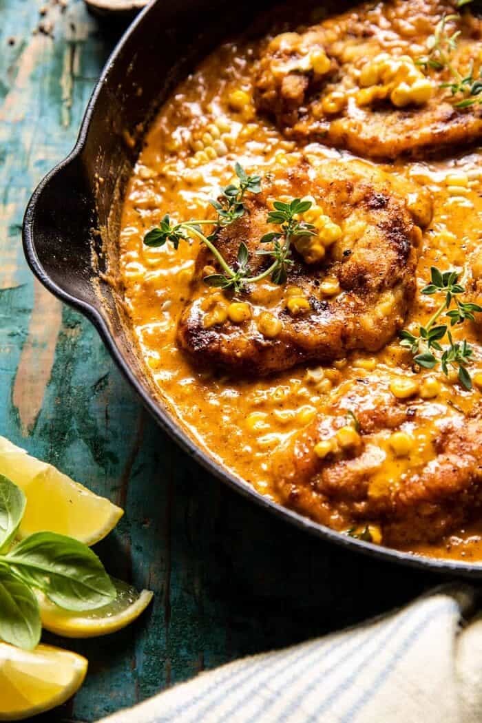 Creamy Cajun Skillet Chicken Lazone with Herby Corn | halfbakedharvest.com side photo of Creamy Cajun Skillet Chicken Lazone with Herby Corn