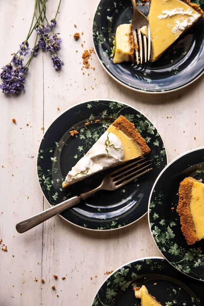 Double Stuffed Vanilla Key Lime Pie | halfbakedharvest.com overhead photo of Double Stuffed Vanilla Key Lime Pie slices on serving plates