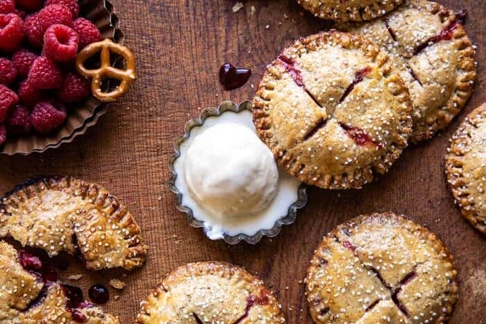 overhead horizontal photo of Jammy Raspberry Cream Pretzel Hand Pies