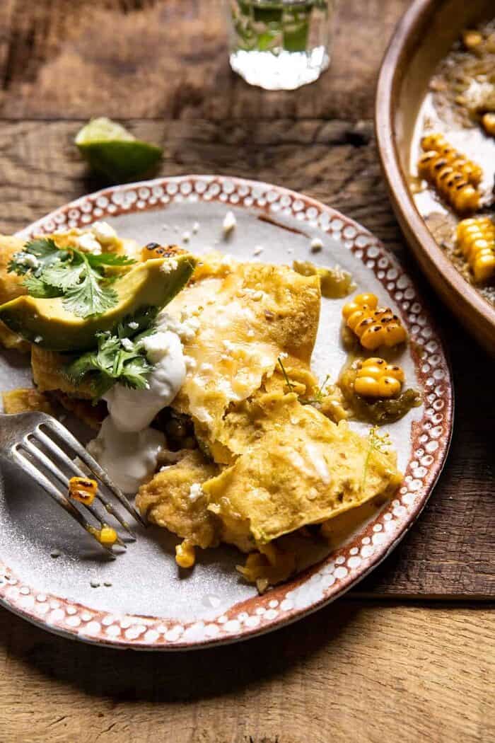 Sheet Pan Chipotle Cheddar Corn Chicken Enchiladas on dinner plate