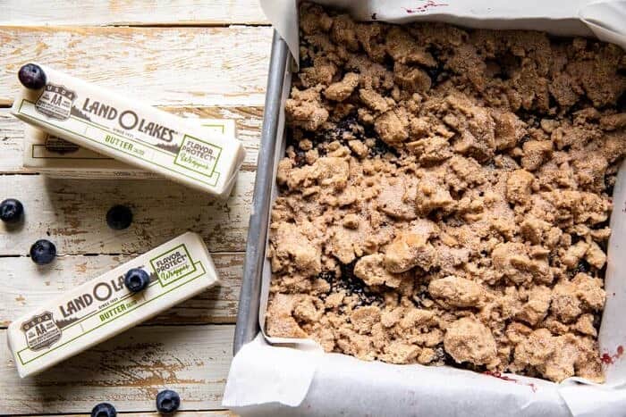 overhead prep photo of Cinnamon Sugar Blueberry Crumb Bars before baking