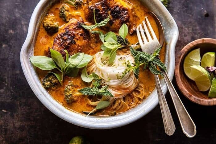 overhead horizontal photo of Saucy Coconut Braised Chicken with Rice Noodles and Broccoli 